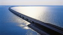 Road expanding across big area of water 
