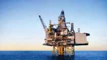 Oil production building in the middle of the water 