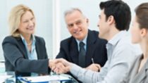 Successful Business Executives Shaking Hands With Each Other