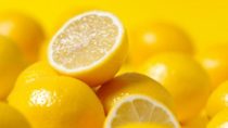 group of lemon on yellow background