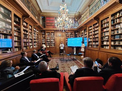 People presenting in a library