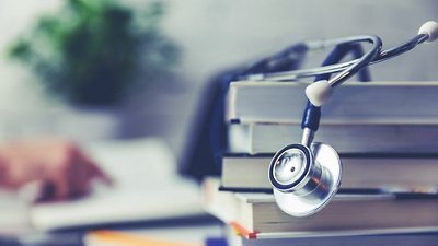 Antimicrobial Resistance & Stewardship Photo of a stethoscope on a stack of books