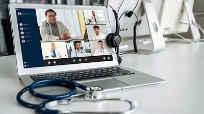 Acute Kidney Injury Computer screen showing a video call between several doctors