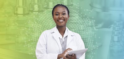 Woman in lab coat at PDA Micro 2023