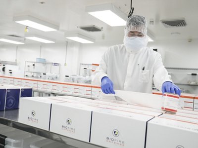Technicians in bioMérieux's Salt Lake City, Utah, facility on June 11, 2026, prepare the BioFire Global Fever Special Pathogens Panel for shipment to Ebola outbreak zones in Central and East Africa. The diagnostic test detects the Ebola Bundibugyo strain. (Niki Chan Wylie/AP Content Services for bioMérieux)