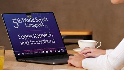 Photo of a person watching the 5th World Sepsis Congress video on a laptop.
