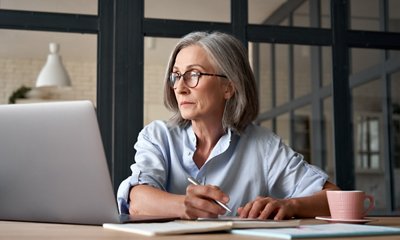 Woman looking at a laptop