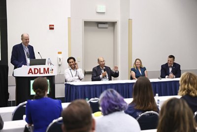 The panelists and the moderator answer questions on Wednesday, July 28, 2026 in Anaheim, Calif. (Mark Von Holden/AP Content Services for bioMérieux)