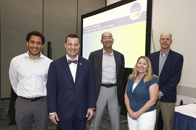Panelists John Hurst, Dr. Omai Garner, Michael Astion, MD, PhD, Helaine Bader, MPH, and moderator Charles K. Cooper, M.D. on Wednesday, July 28, 2026 in Anaheim, Calif. (Mark Von Holden/AP Content Services for bioMérieux)
