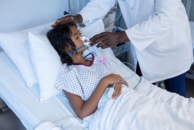Midsection of male doctor putting oxygen mask ventilator on sick mixed race girl in hospital bed

•	Image provider: Adobe Stock
•	Image ID: 430373872
•	License: Extended use
