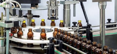 bottles on assembly line