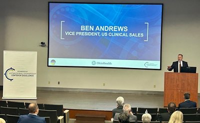 Ben Andrews of bioMérieux presents to spectators on the importance of the COE partnership