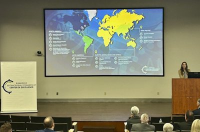 Lauren Hunt of bioMérieux presents to spectators on the importance of the COE partnership