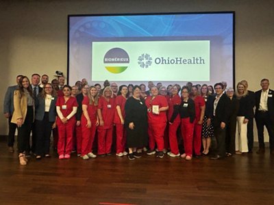 OhioHealth and bioMerieux pose for a picture after the Center of Excellence event on August 26