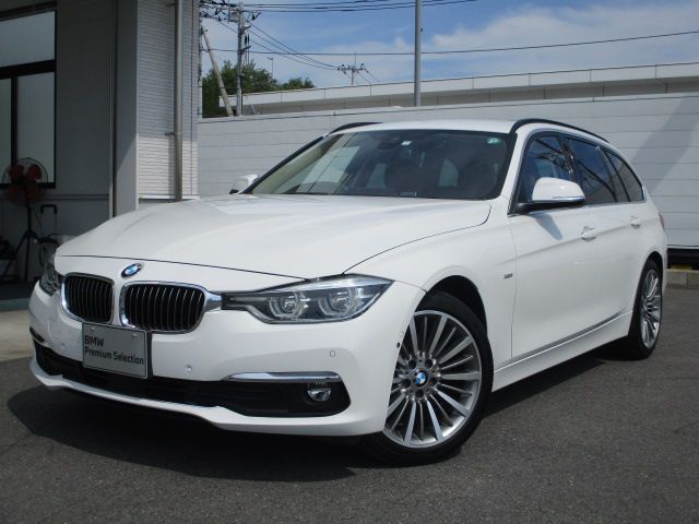320i Touring Luxury