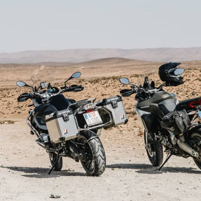 This image shows a back view of adventure bikes with Bridgestone adventure tyres