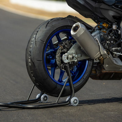 This image shows the Battlax RS11 motorcycle tyre on a Sport road.