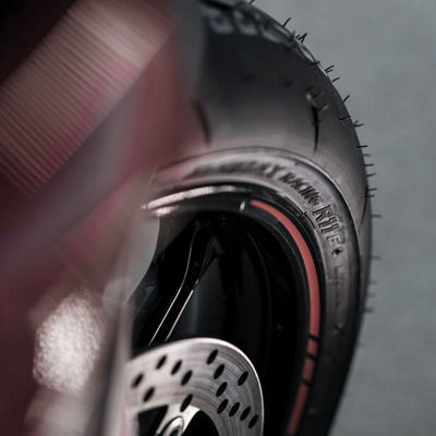 This images shows a close up of a brand new Bridgestone Battlax R11 Race tyre at the rear end of the motorcycle.