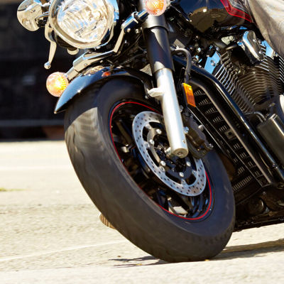 This picture is a close up of a Bridgestone Exedra Max tyre on a classic motorbike.