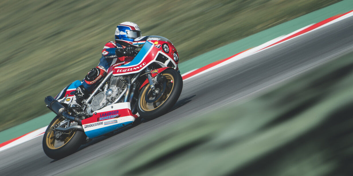 This image shows a motorcycle racer in a sharp corner counting on its Bridgestone tyres.