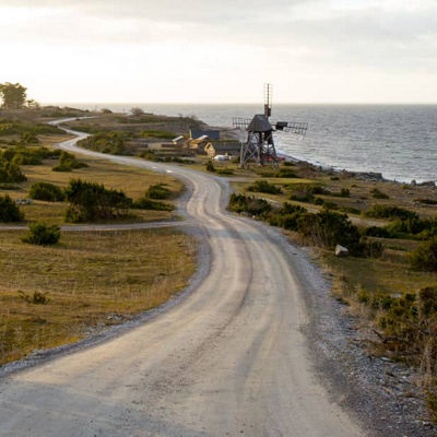 This image shows an empty scenic road, which is ideal for Bridgestone custom motorcycle tyres