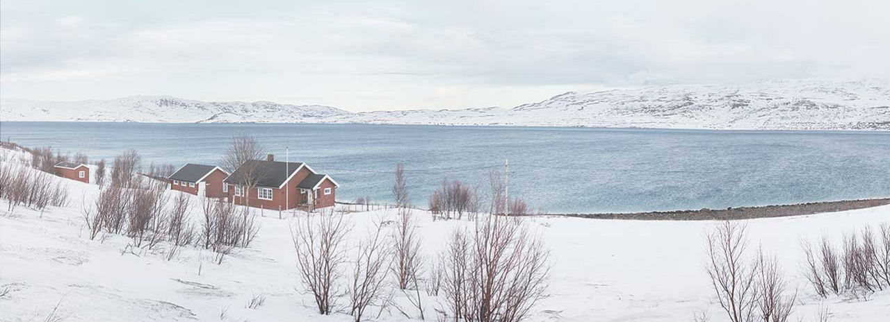Bilden visar ett rofyllt vinterlandskap för att visa att Noranza-vinterdäck är idealiska för nordiska och subarktiska klimat. 