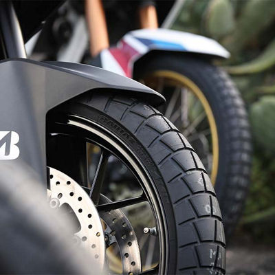 Close-up of a motorcycle equipped with Bridgestone Battlax AT41 tyres