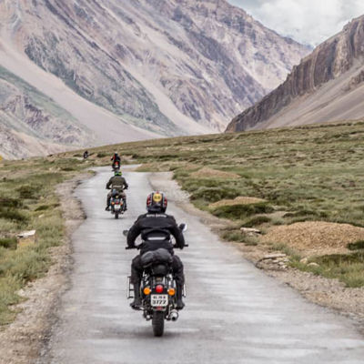 This image shows motorcyclists riding with Bridgestone custom motorcycle tyres