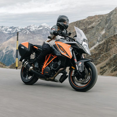 On this picture we see a motorcyclist touring in the mountains on Bridgestone Battlax BT-023 tyres.
