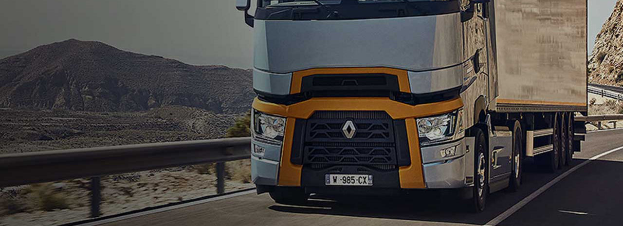 This image shows a Renault truck travelling down a highway with Bridgestone tyres. 