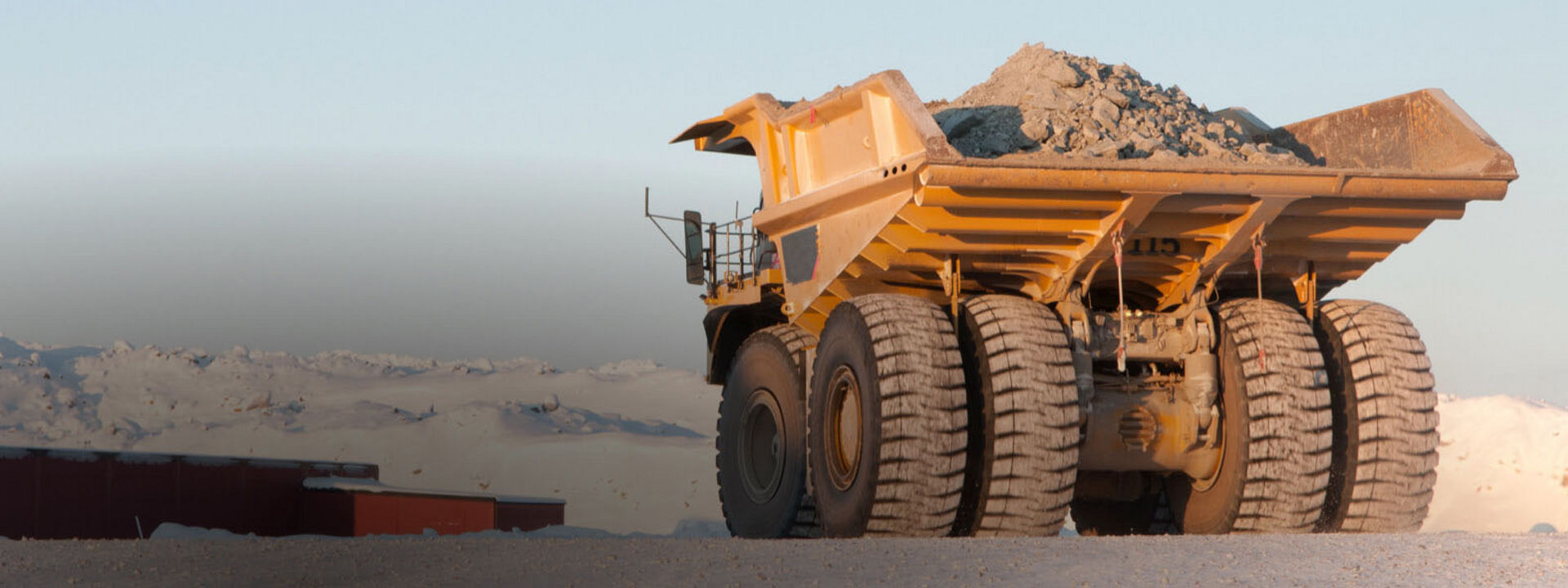 A rigid dump truck equipped with Bridgestone off-the-road tyres