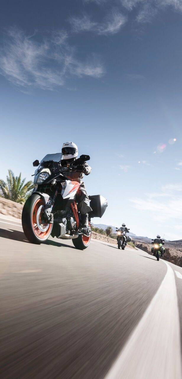 This image shows three motorcyclists touring under a great sky on their Bridgestone Battlax BT-31 tyres.