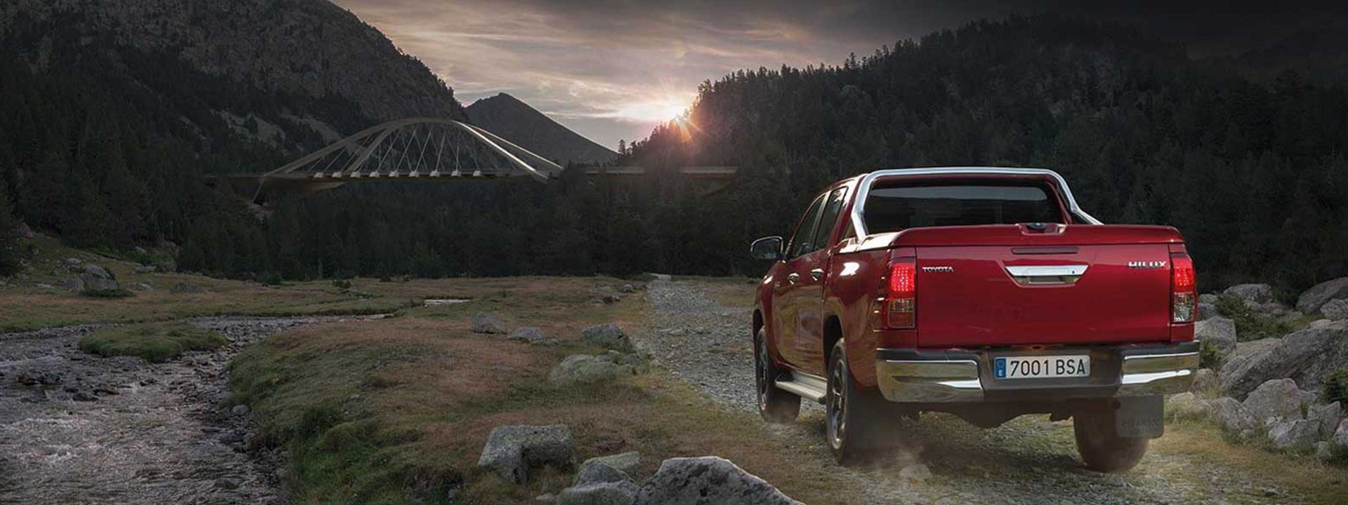 vehicle with 4x4 tyres travelling offroad on rocky terrain