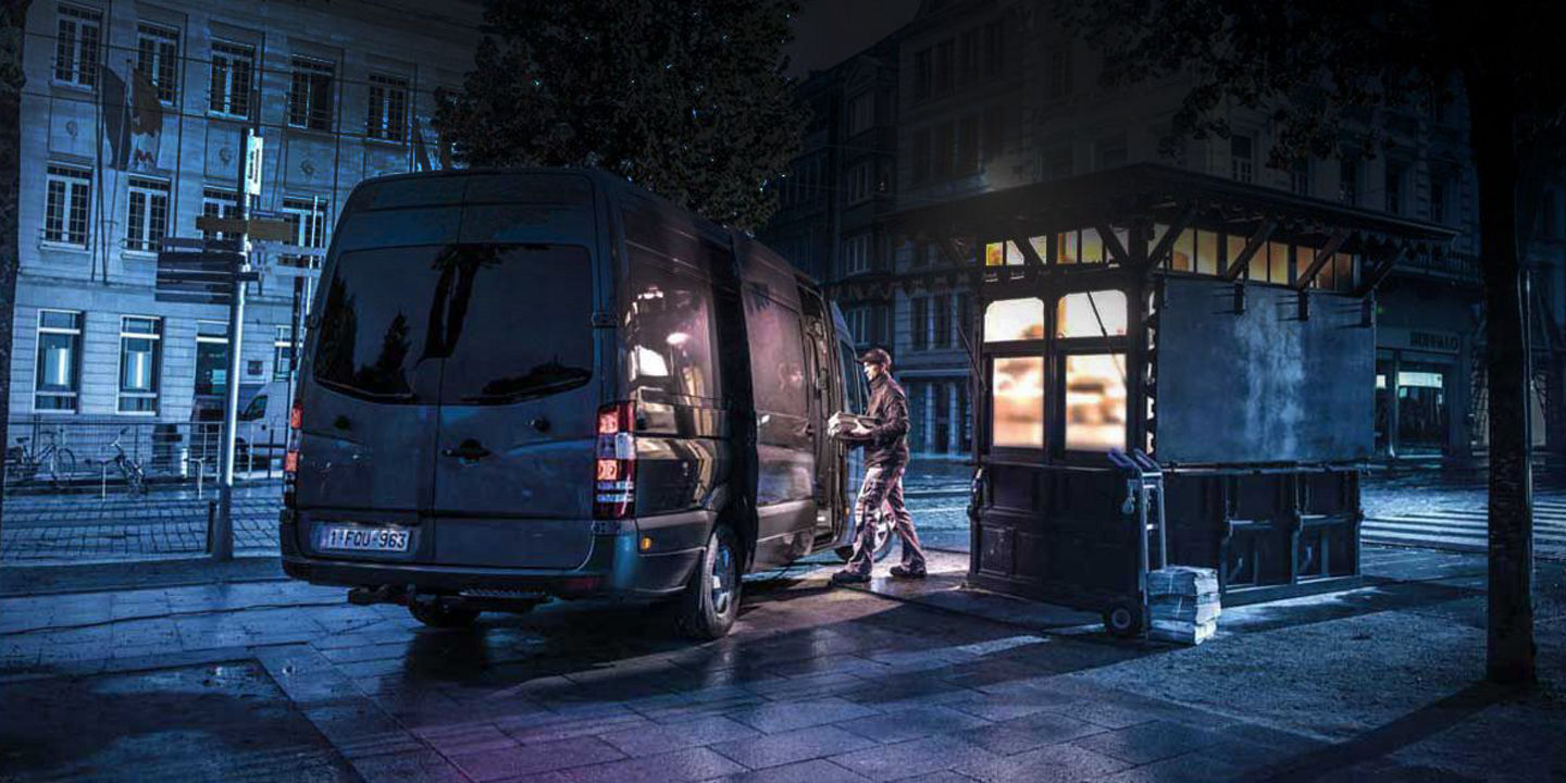 a van on a square during the evening