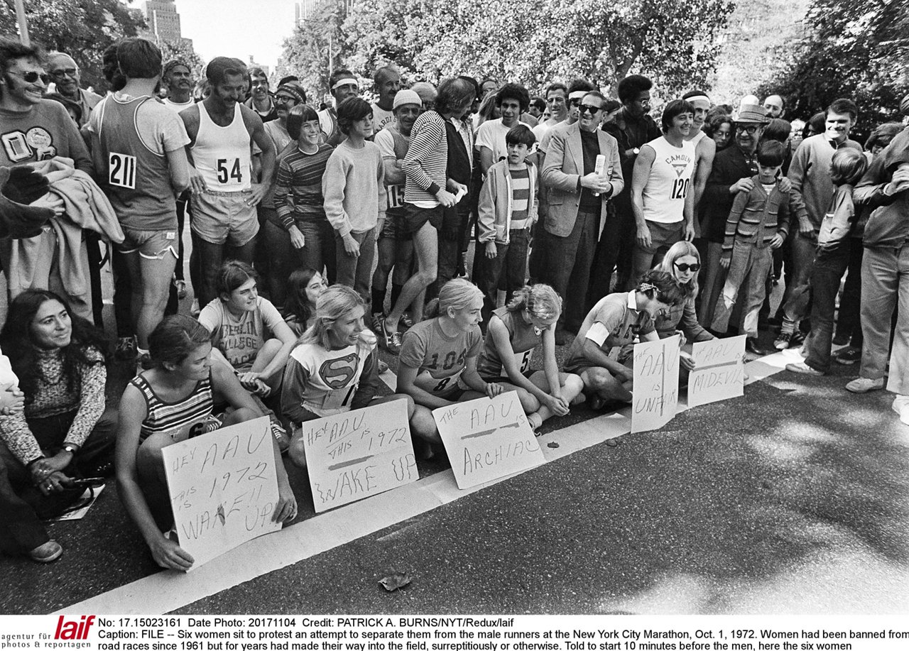 FILE -- Six women sit to protest an attempt to separate them from the male runners at the New York City Marathon, Oct. 1, 1972. Women had been banned from road races since 1961 but for years had made their way into the field, surreptitiously or otherwise. Told to start 10 minutes before the men, here the six women waited 10 minutes then began running. (Patrick A. Burns/The New York Times) 