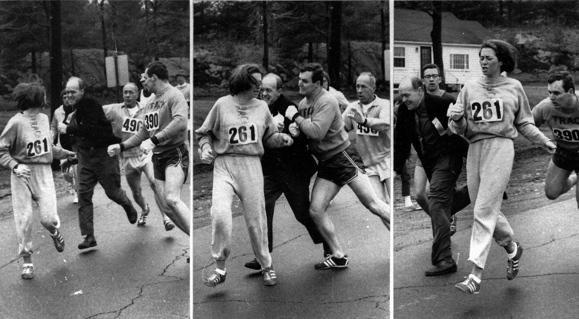 Iconic image of Kathrine Switzer being chased down by Jock Semple at the 1967 Boston Marathon