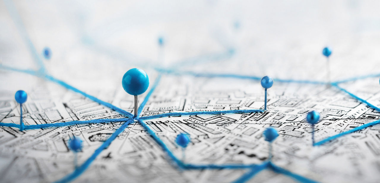 Find your way. Location marking with a pin on a map with routes. Adventure, discovery, navigation, communication, logistics, geography, transport and travel theme concept background.; Shutterstock ID 2391577783; purchase_order: sito; job: ; client: ; other: 