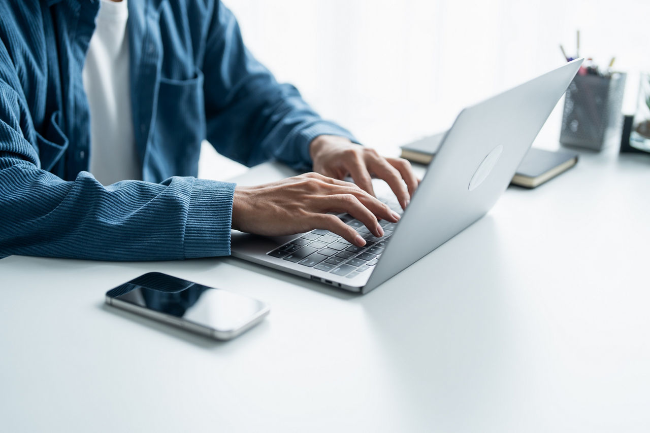Man working by using a laptop computer Hands typing on keyboard. writing a blog. Working at home are in hand finger typewriter; Shutterstock ID 2673406875; purchase_order: sito; job: ; client: ; other: 
