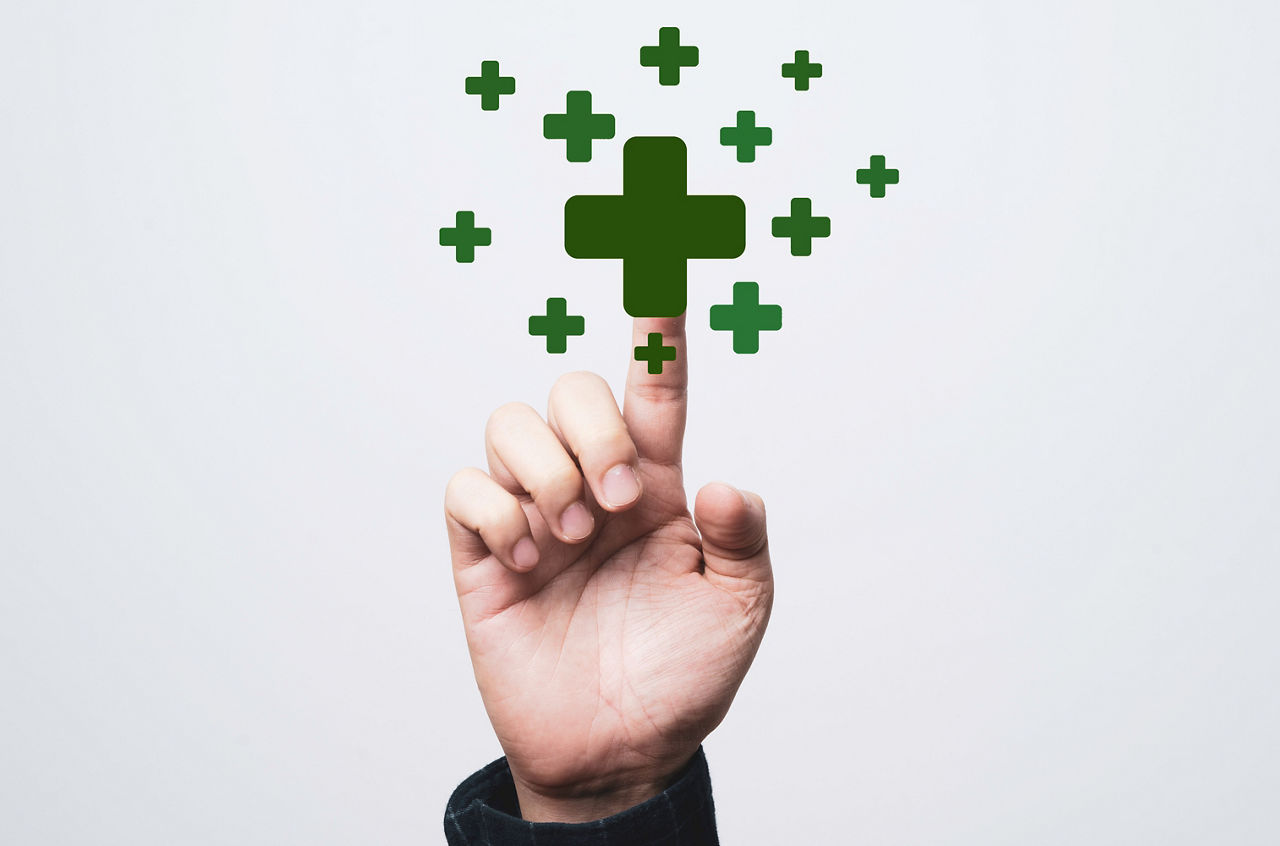 Businessman touching virtual orange plus sign for positive thinking mindset or healthcare insurance symbol concept.; Shutterstock ID 2118891896; purchase_order: -; job: -; client: -; other: