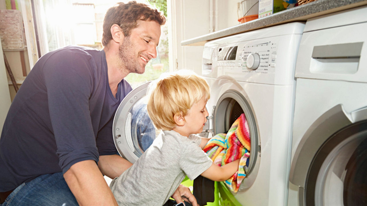 covid-19-father-son-washing-machine.jpg