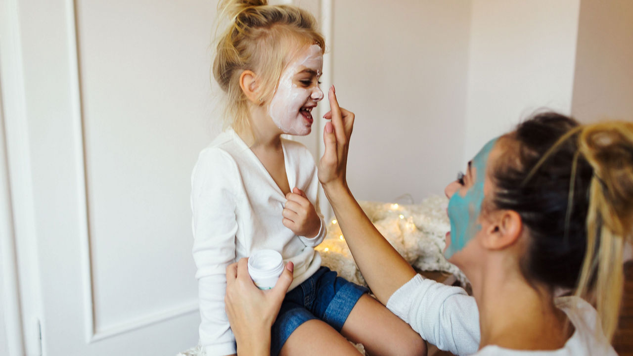 covid-19-mother-daughter-facepaint-playing.jpg