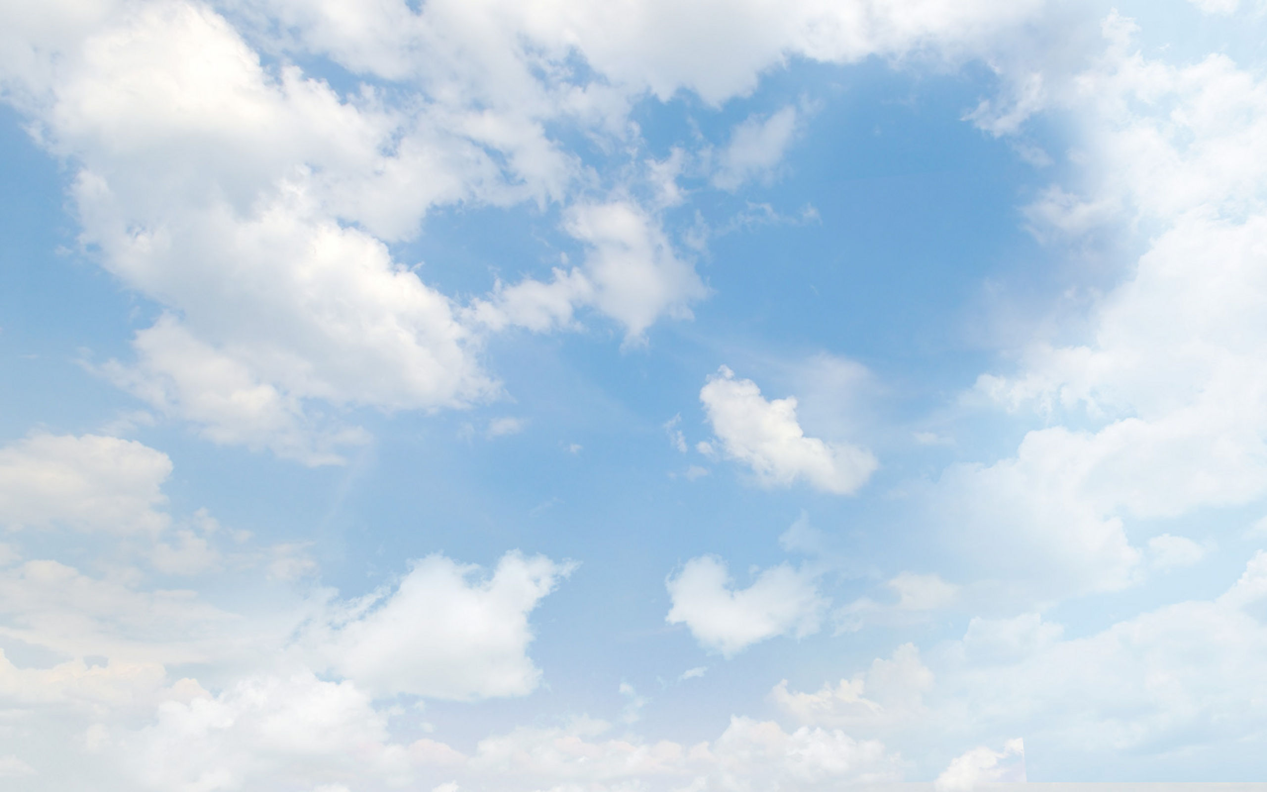 Ein Bild eines blauen Himmels mit weißen Wolken