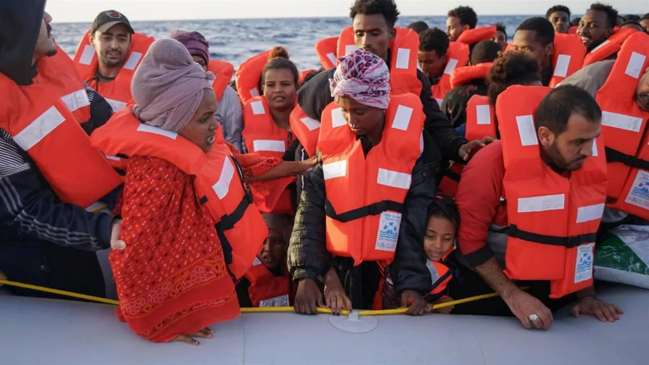 Personas rescatadas por Sea Watch en el Mediterráneo, la semana pasada. EFE