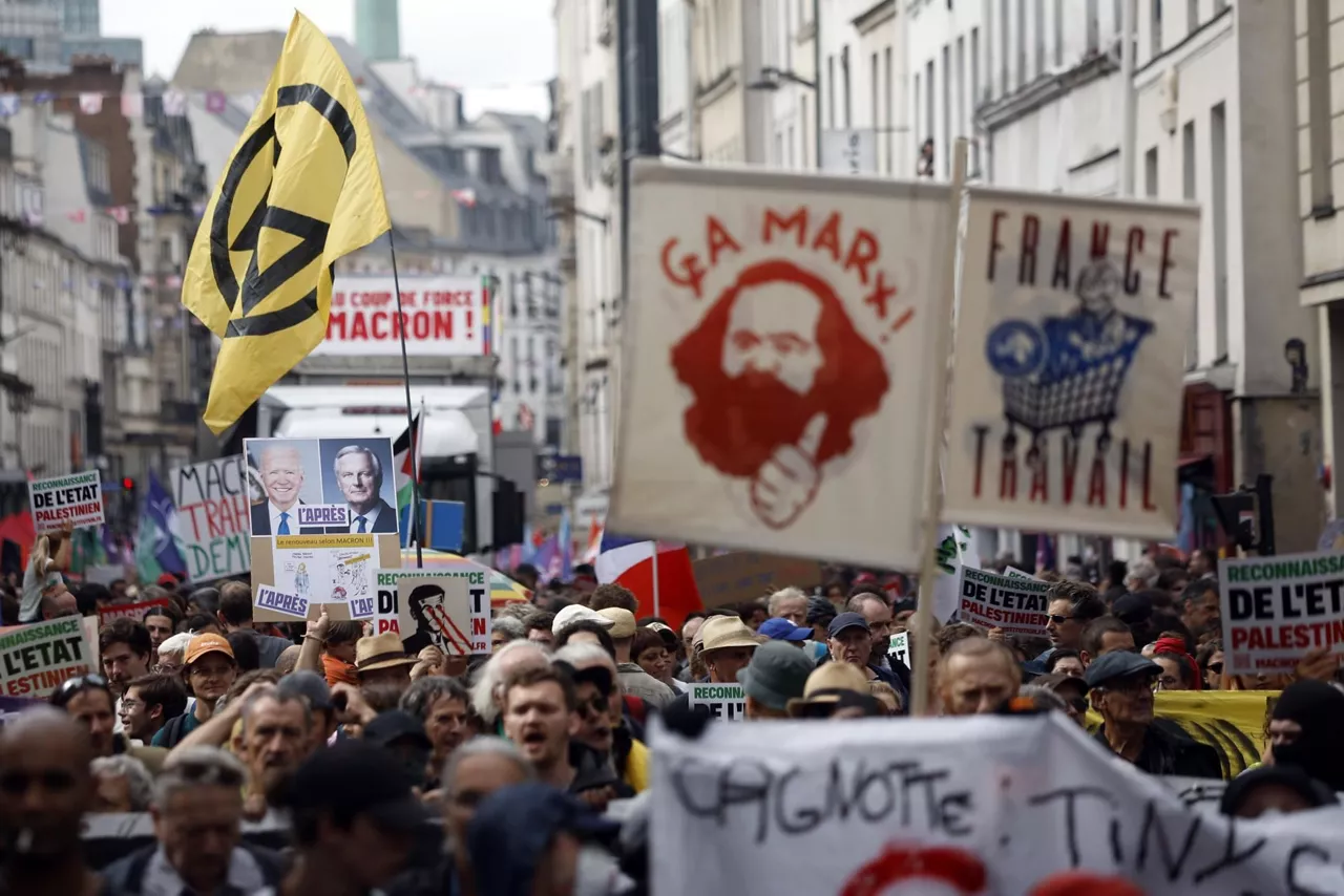 macronen aurkako manifestazioa parisen ezkerreko alderdiek deituta efe