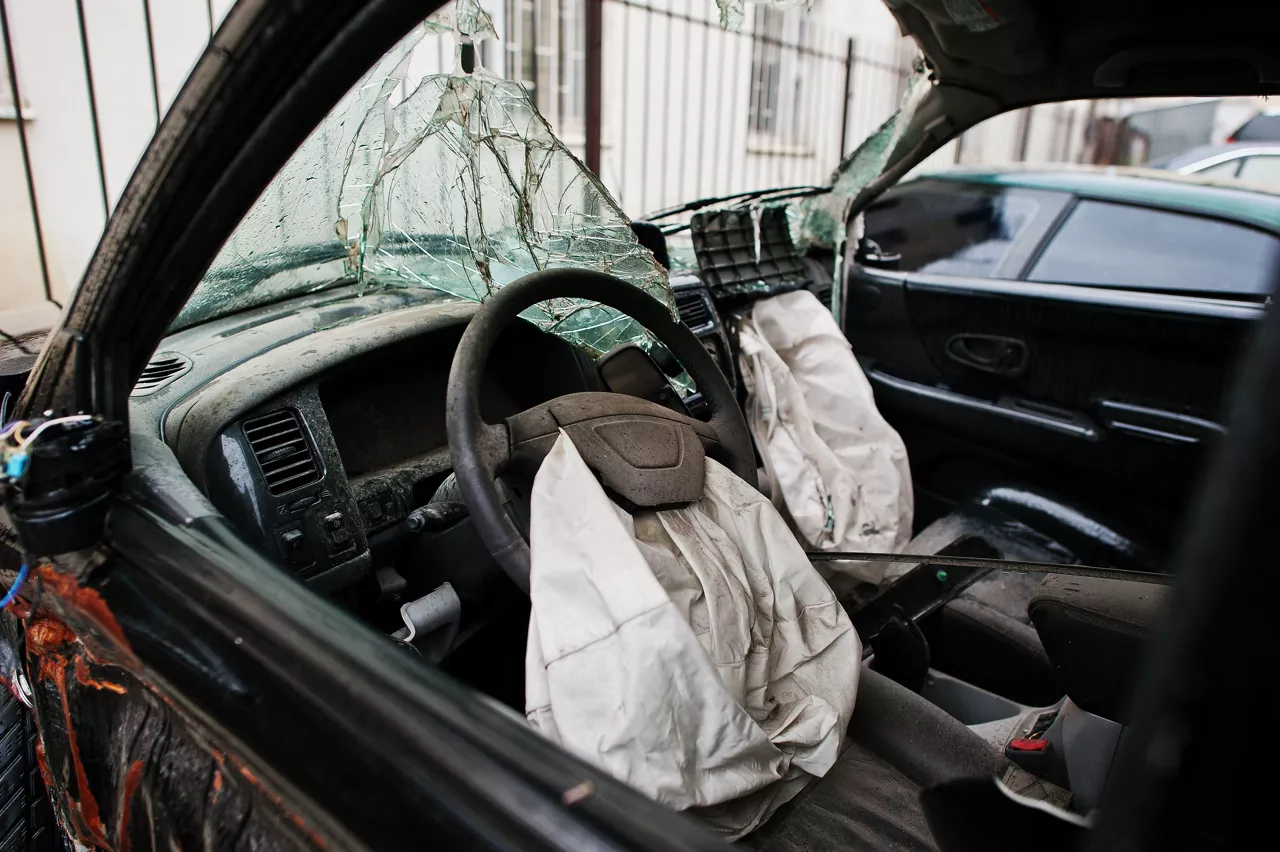 car-after-accident-car-interior-with-airbag-after-crash