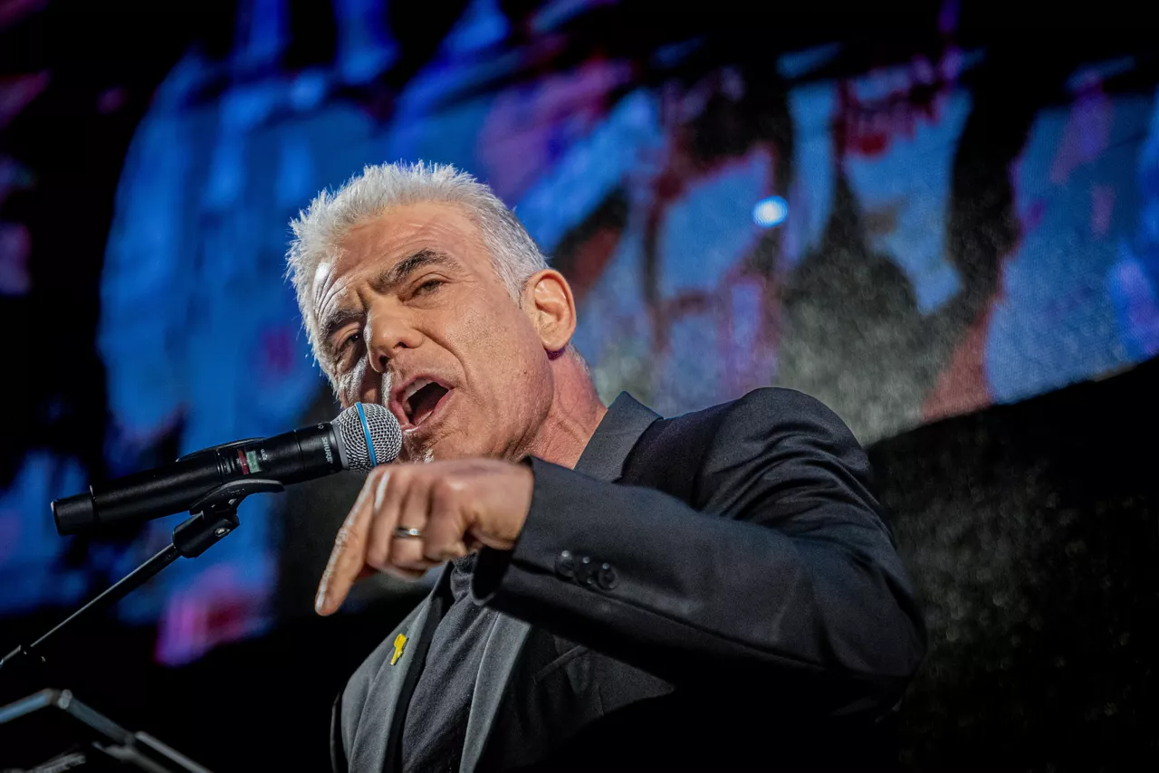 Israeli opposition Leader and former Prime Minister, Yair Lapid, speaks during the demonstration. Israeli war cabinet minister Benny Gantz has threatened to resign unless Prime Minister Benjamin Netanyahu sets out a post-war plan for the Gaza Strip. Gantz has set an 8 June deadline for a plan to achieve six ''strategic goals'', including the end of Hamas rule in Gaza and the establishment of a multinational civilian administration for the territory.