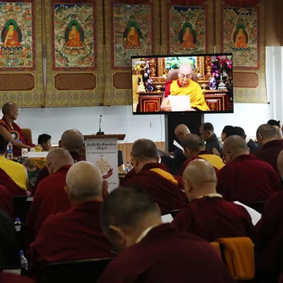 DHARAMSALA (India), 02/07/2025.- A TV screen shows His Holiness the Dalai Lama’s recorded message at the main temple of Tsuglhakhang in McLeod Ganj, near Dharamsala, India, 02 July 2025. The Dalai Lama has ended decades of speculation about his succession by affirming that his 600-year-old spiritual lineage will continue. In a significant move, he announced the formation of a committee composed of his most trusted advisors, who will serve as the sole authority in identifying his successor. An awaited video message became the spiritual leader's living testament, laying out a roadmap for the eventual succession. EFE/EPA/STRINGER
