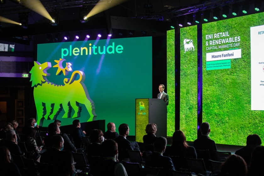 A man is talking at a Plenitude conference 