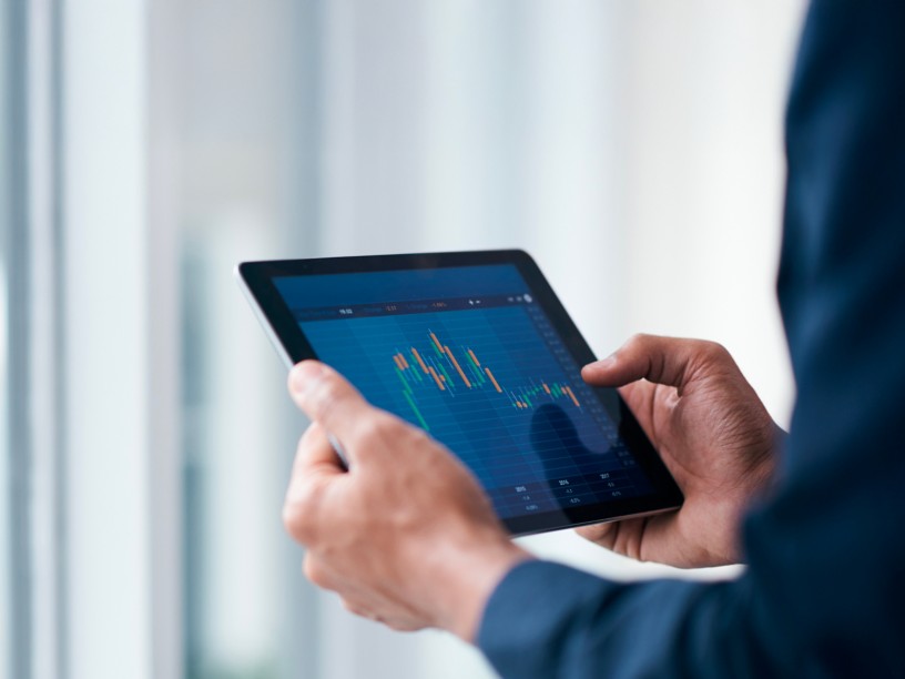Investment chart displayed on a tablet screen