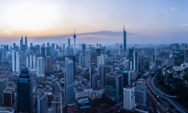 the city of Kuala Lumpur seen from a drone at sunset